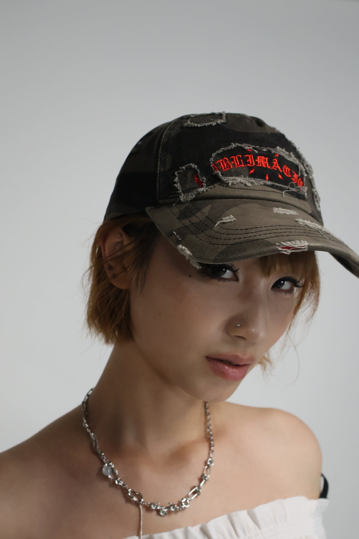 damage camouflage cap  I38