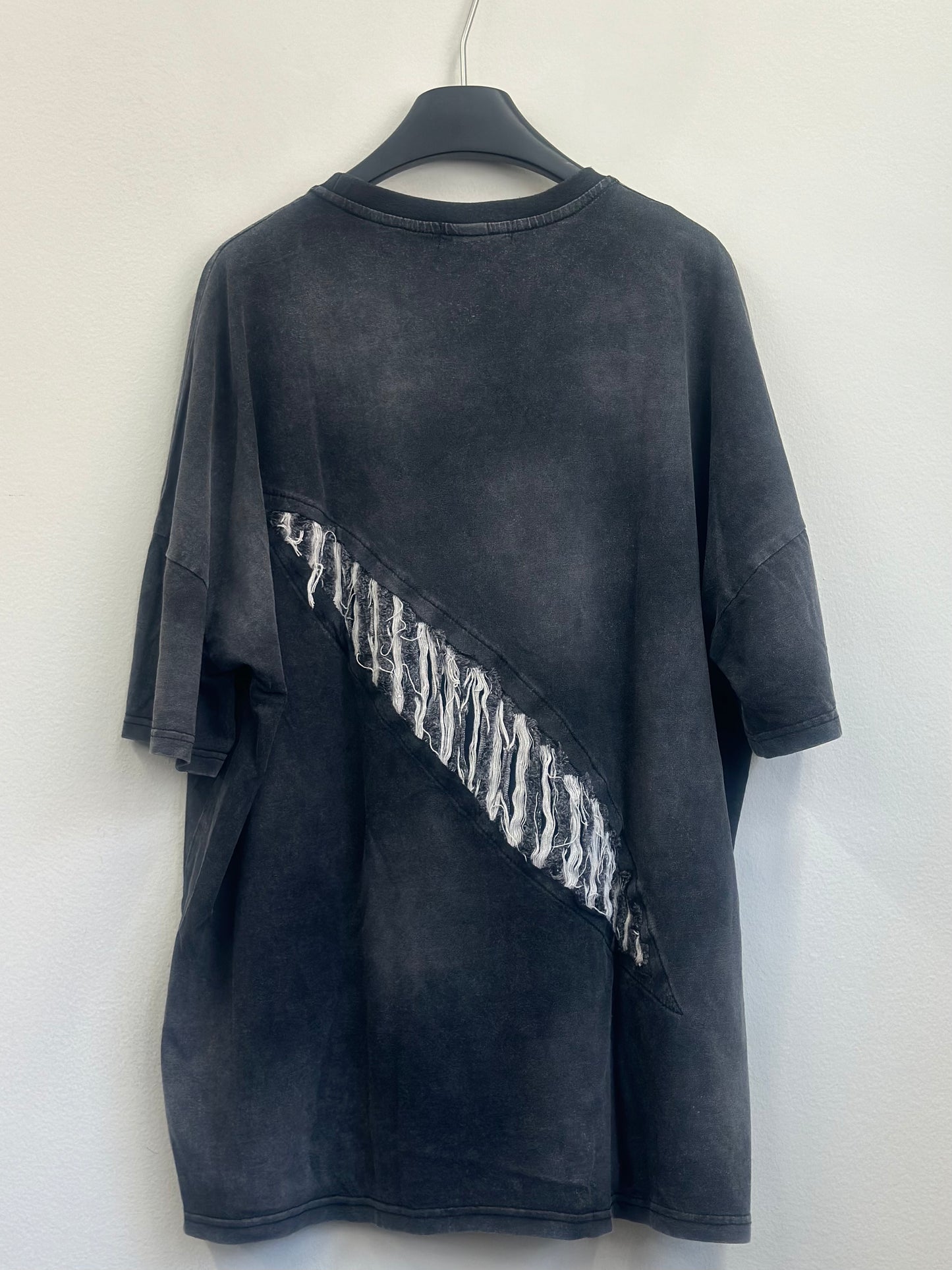 damage over tee A163